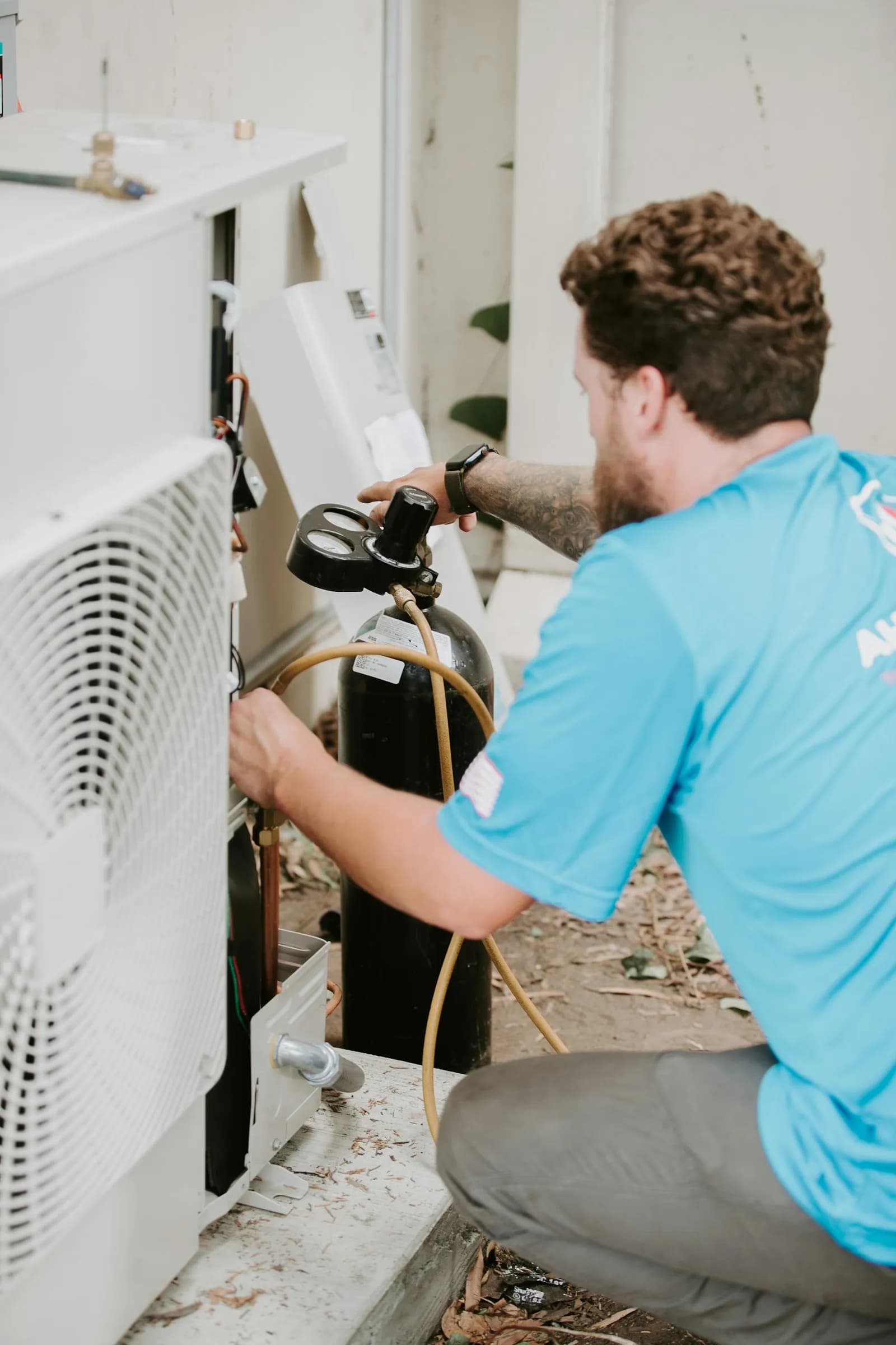Air conditioner servicing (sample photo)